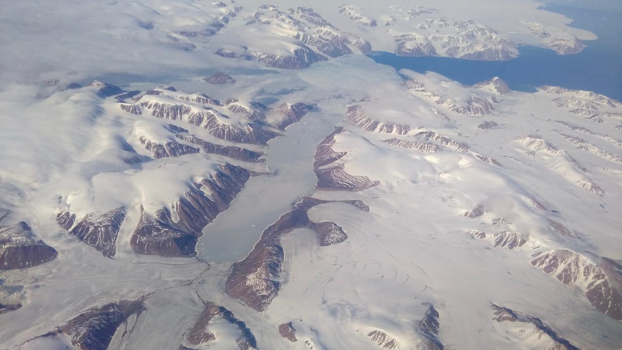 View from the plane. Glaciers north of Canada.